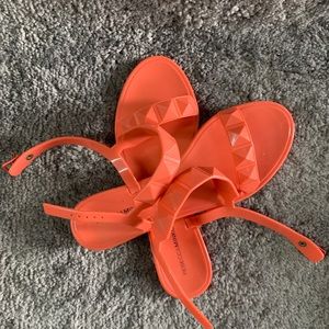 Bright orange jelly sandals